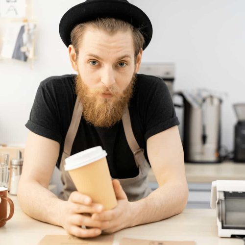 handsome-barista-in-hat-2023-11-27-05-18-25-utc.jpg