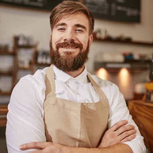 happy-young-barista-at-work-2024-09-19-05-19-16-utc.jpg